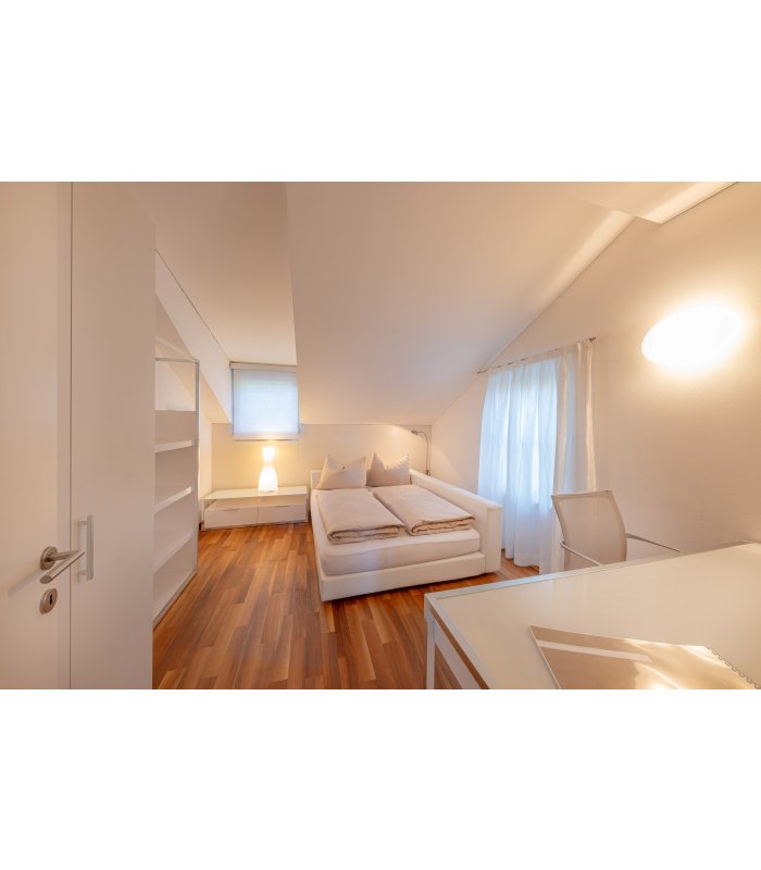 Schlafzimmer mit Doppelbett